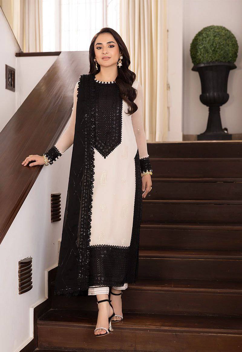 Ivory and Black Embroidered Salwar Kameez Set with Lace Detailing