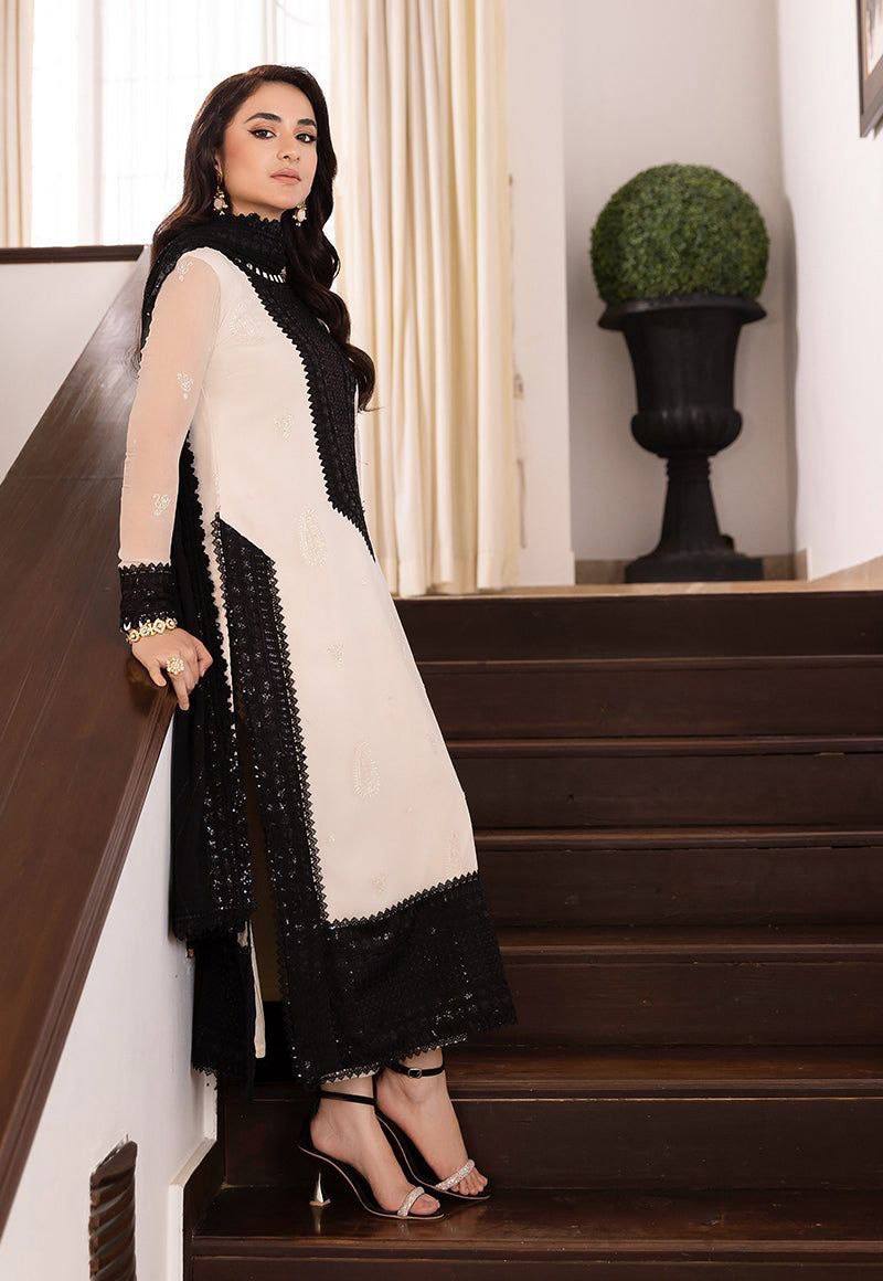 Ivory and Black Embroidered Salwar Kameez Set with Lace Detailing