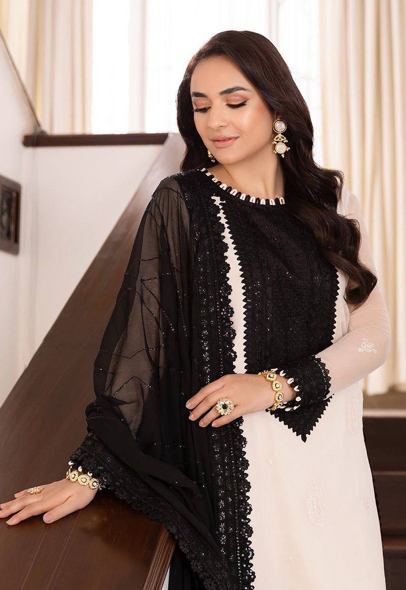 Ivory and Black Embroidered Salwar Kameez Set with Lace Detailing