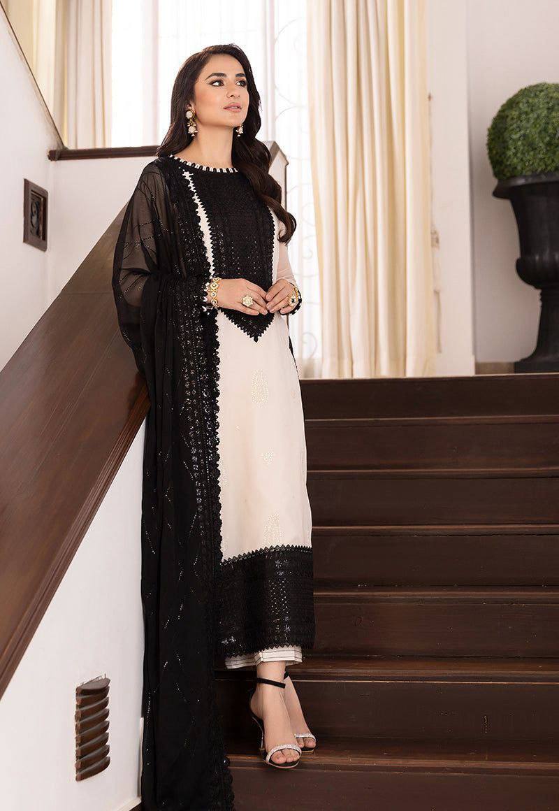 Ivory and Black Embroidered Salwar Kameez Set with Lace Detailing