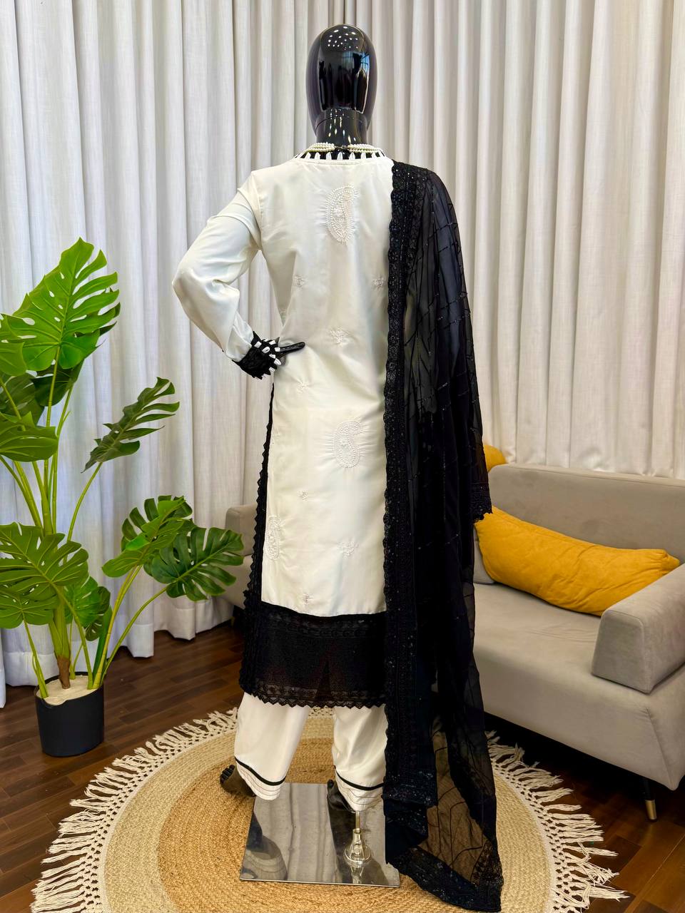 Ivory and Black Embroidered Salwar Kameez Set with Lace Detailing